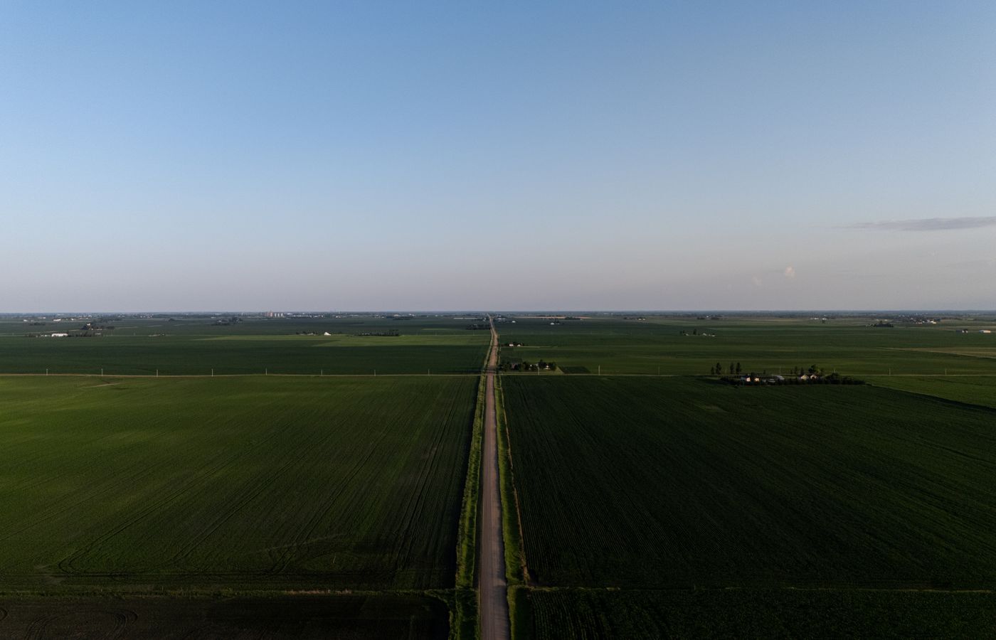 Aerial view of Canadian countryside and farmland in warm light